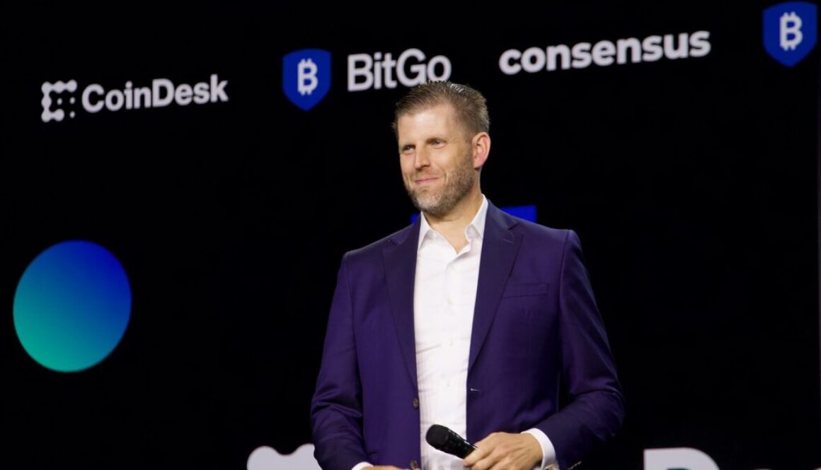 Eric Trump speaking on stage at the Consensus 2025 crypto conference